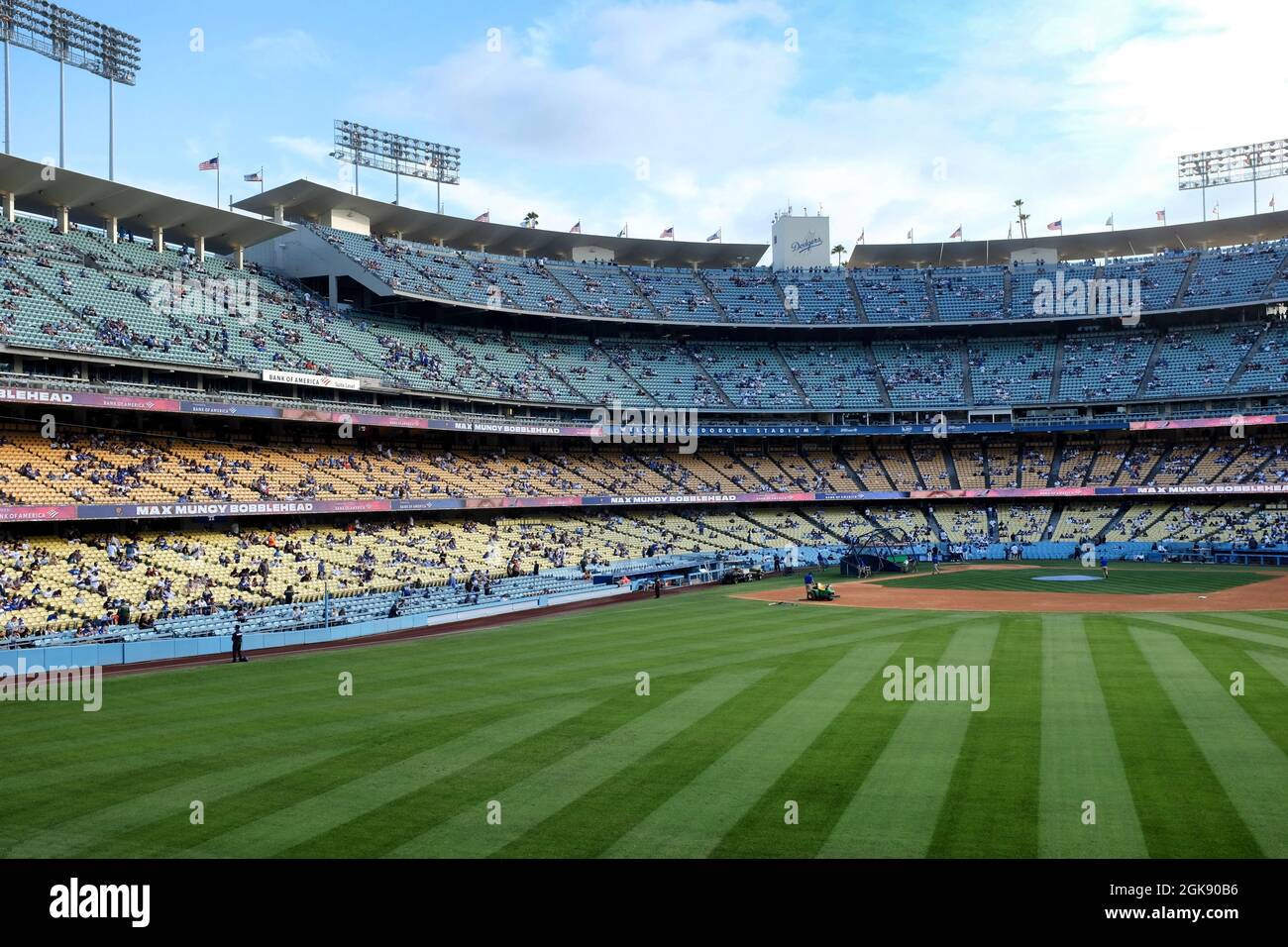LOS ANGELES, CALIFORNIA, 29 JUNE 2021: Dodger Stadium. Home plate and stands viewed from Right Field, as the grounds crew preps for a a game. Stock Photo