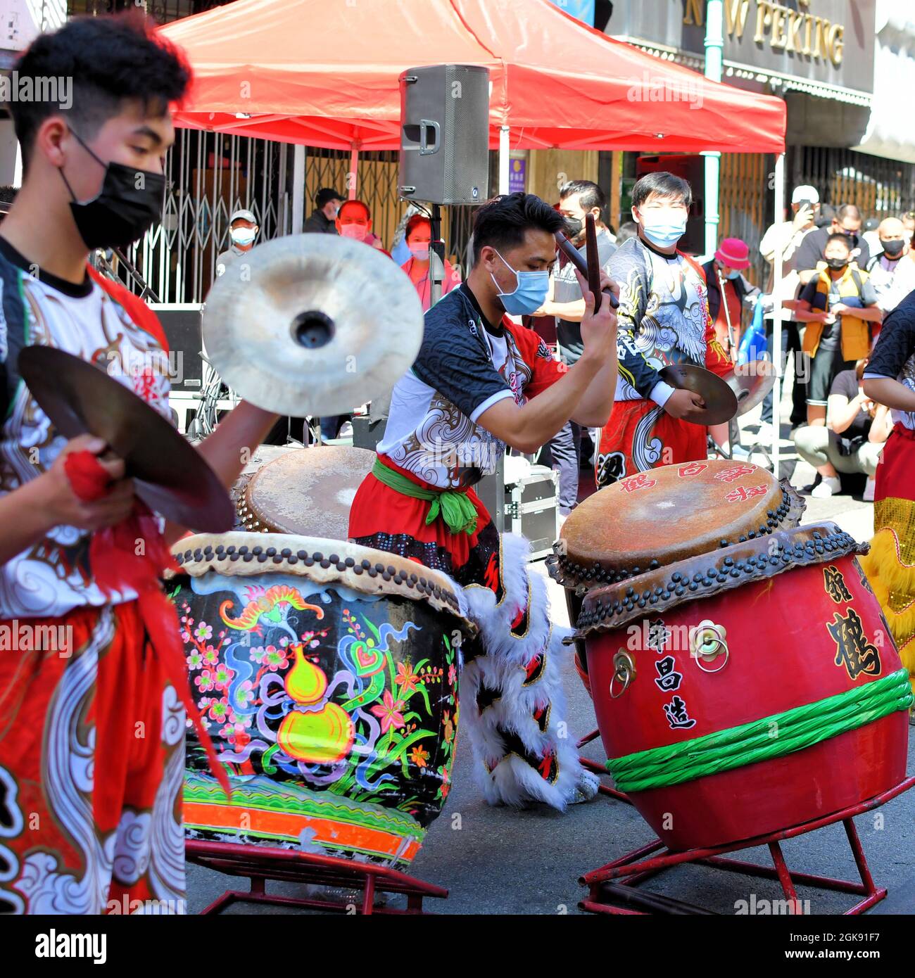 Lion dance musicians with traditional Chinese instruments at the
