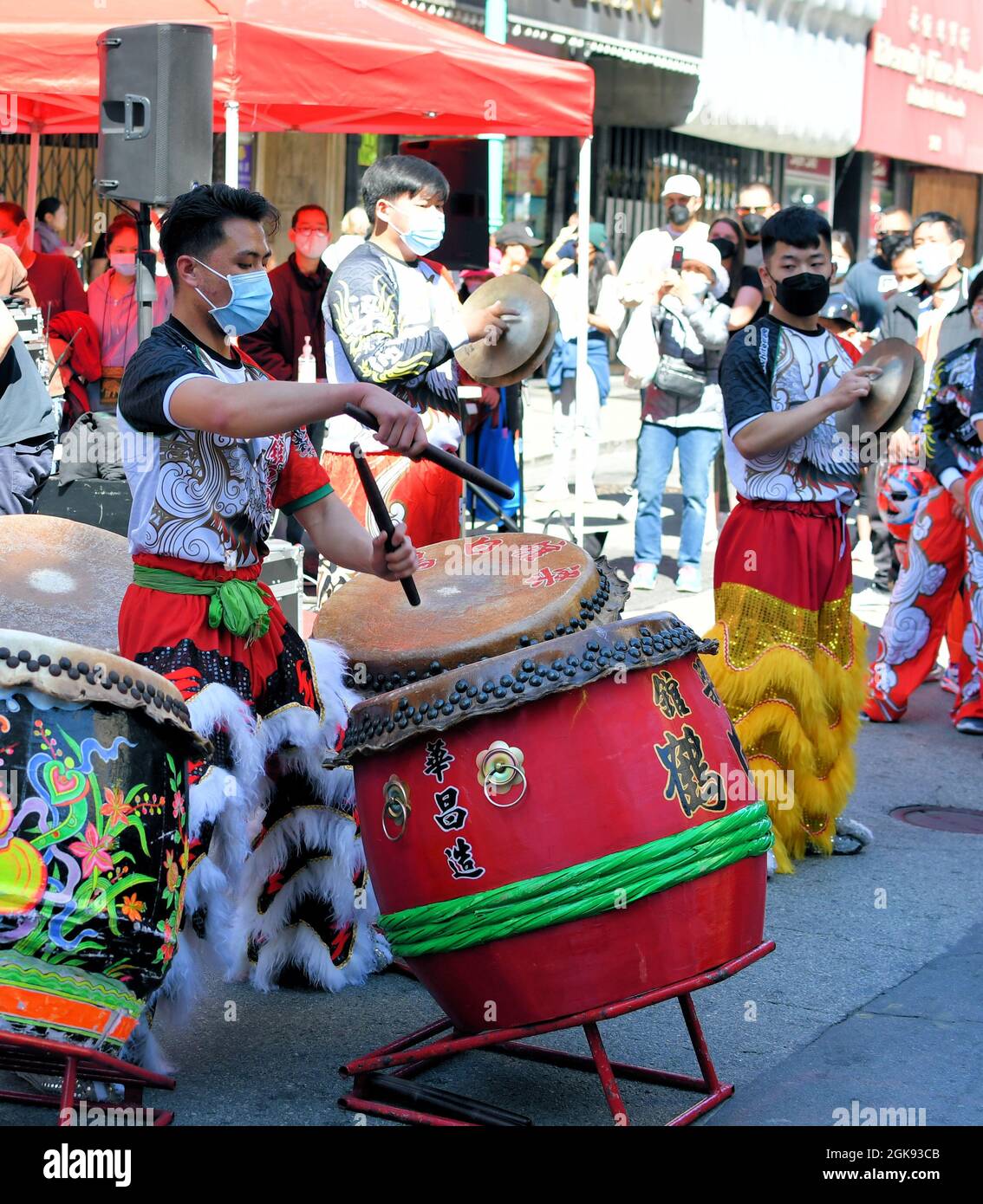 Lion dance musicians with traditional Chinese instruments at the
