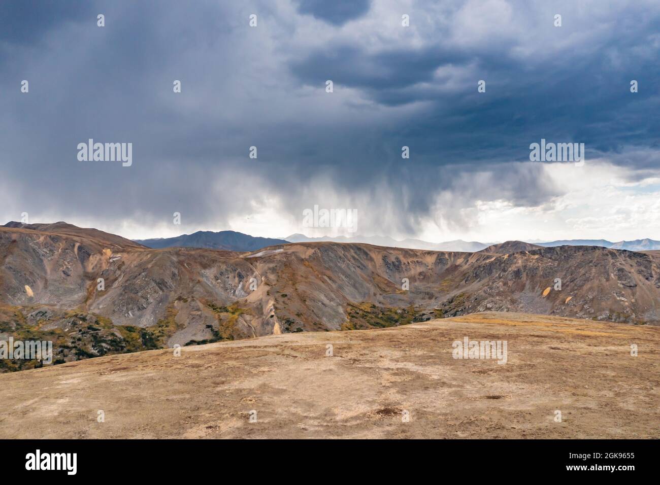 Developing Thunderstorm over Rocky Mountains in Colorado Stock Photo