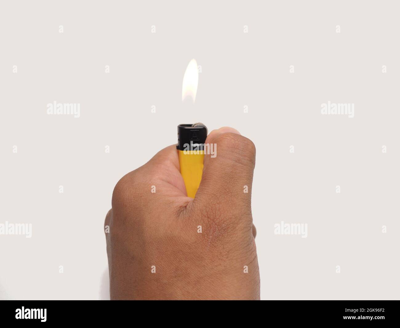 Picture of yellow lighter. Shoot on white isolated background Stock Photo