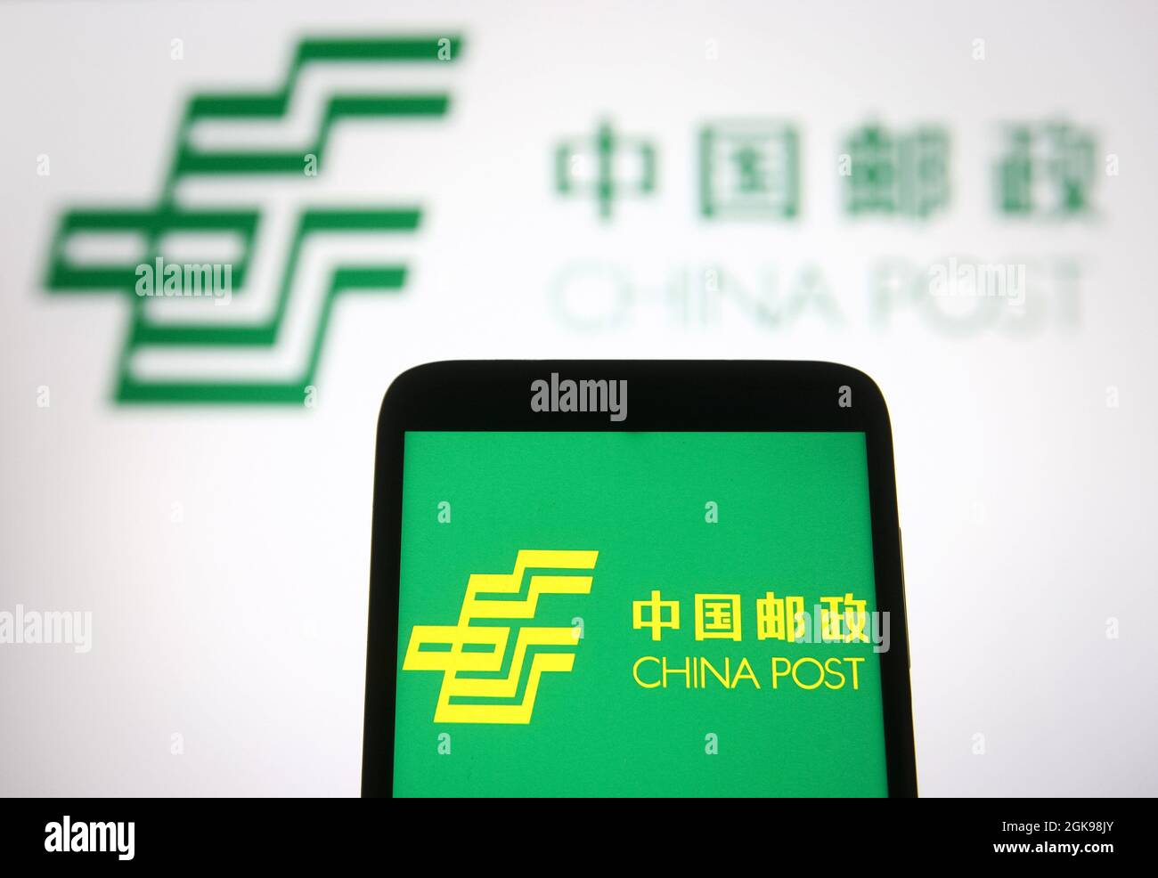 In this photo illustration a China Post Group Corporation logo is seen