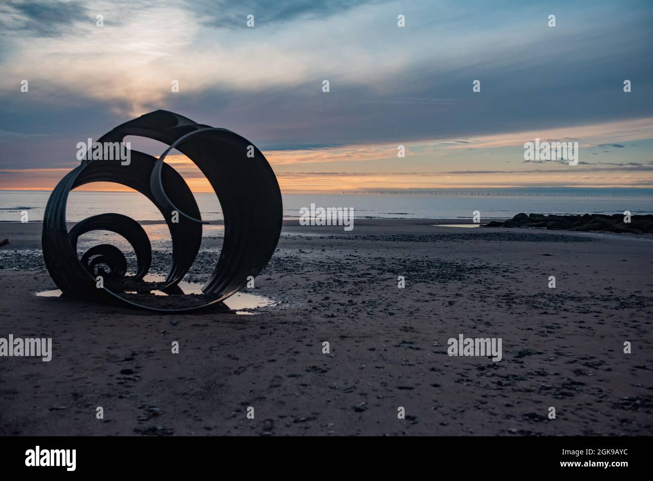 Mary's Shell at Cleveleys around Sunset public art metal sculpture by