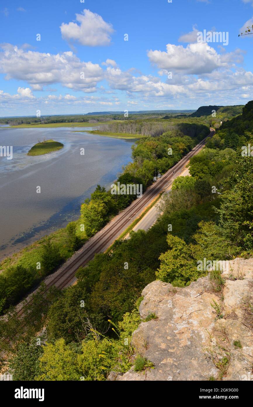 View of railroad tracks along the Mississippi River at the Lookout Point overlook at Mississippi Palisades State Park outside of Savanna Illinois. Stock Photo
