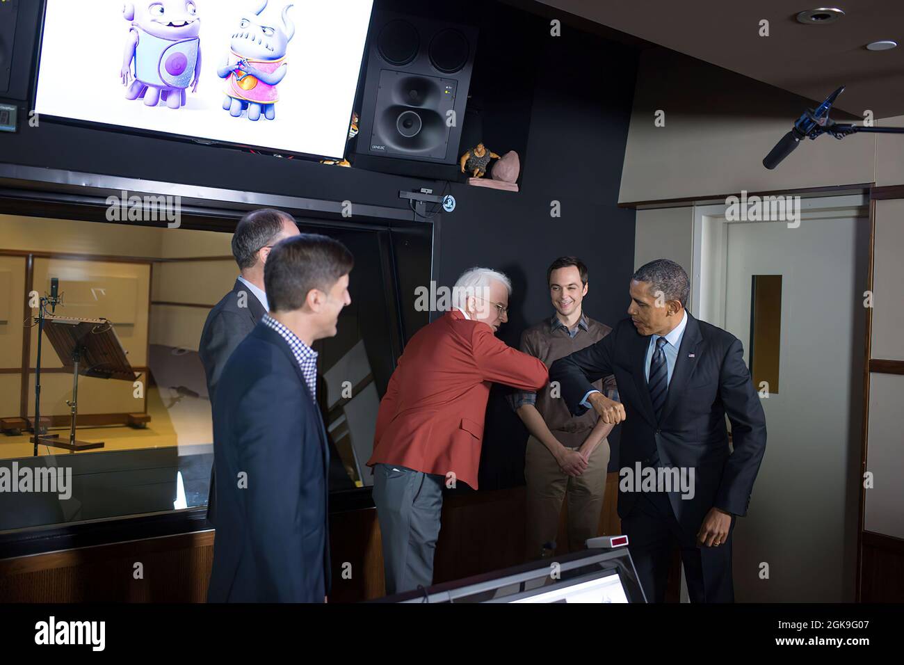 President Barack Obama greets Steve Martin during a tour of the Glendale campus of movie studio DreamWorks Animation SKG in Glendale, Calif., Nov. 26, 2013. (Official White House Photo by Chuck Kennedy) This official White House photograph is being made available only for publication by news organizations and/or for personal use printing by the subject(s) of the photograph. The photograph may not be manipulated in any way and may not be used in commercial or political materials, advertisements, emails, products, promotions that in any way suggests approval or endorsement of the President, the Stock Photo