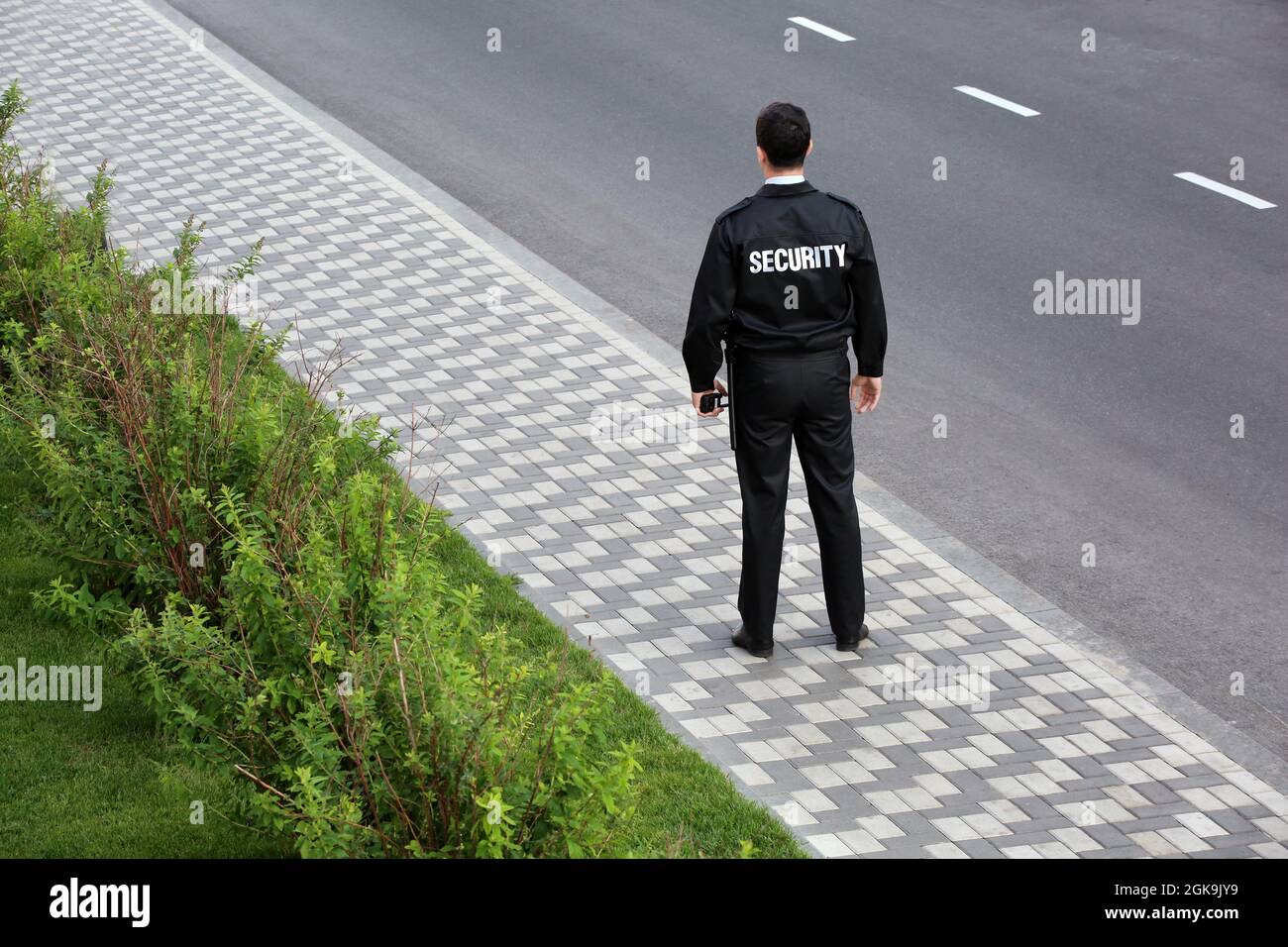 Male security guard, outdoors Stock Photo - Alamy