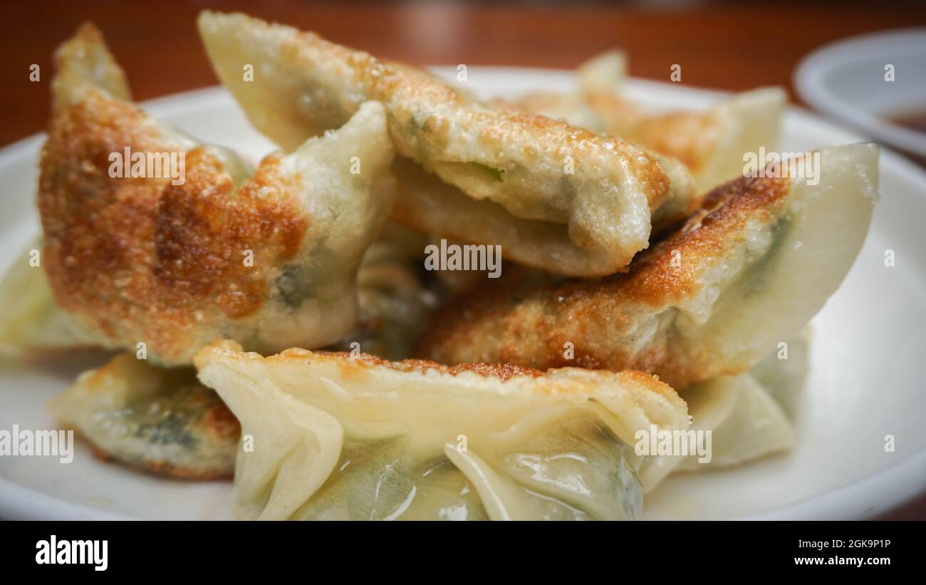 Traditional Chinese homemade pan fried dumpling, vinegar, China Stock