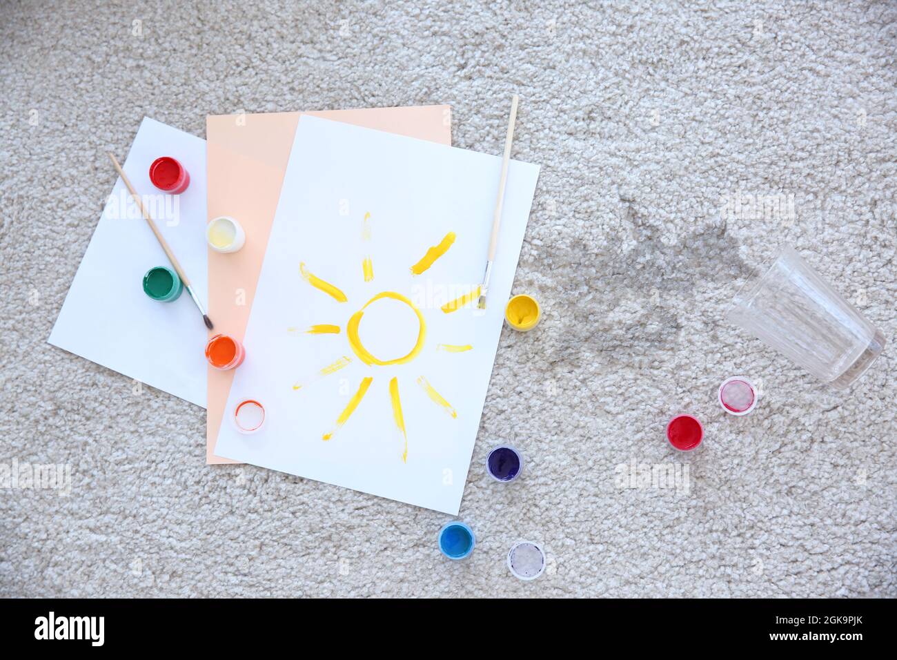 Picture, paints and spilled water on carpet Stock Photo Alamy