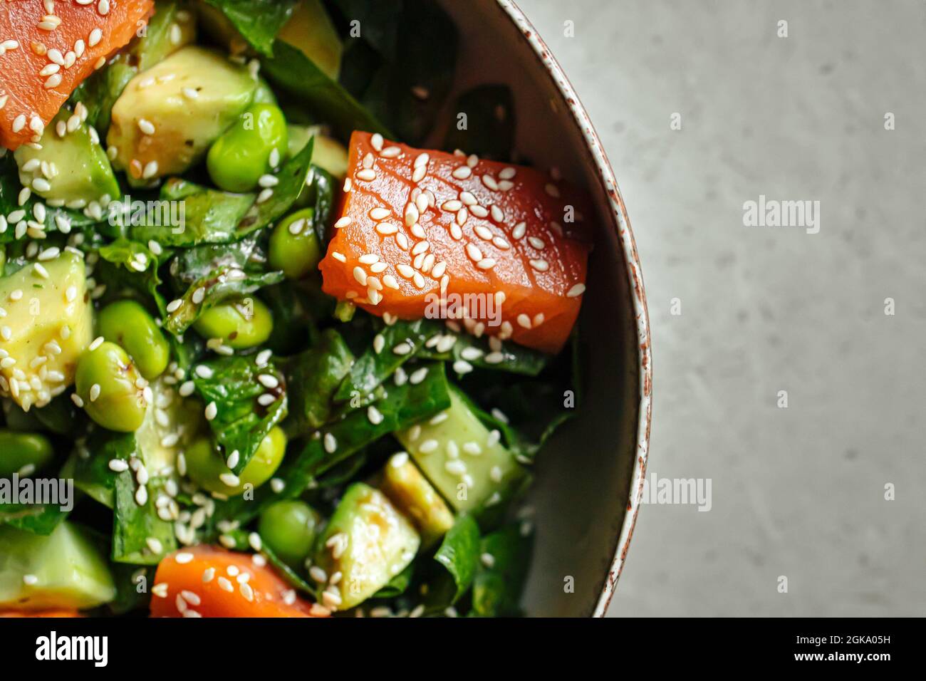 Healthy salmon bowl with avocado and edamame beans Stock Photo Alamy