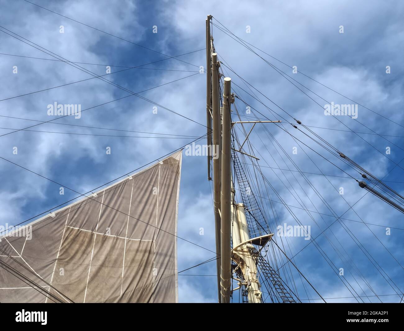 Sail and ropes of sailing ship Stock Photo