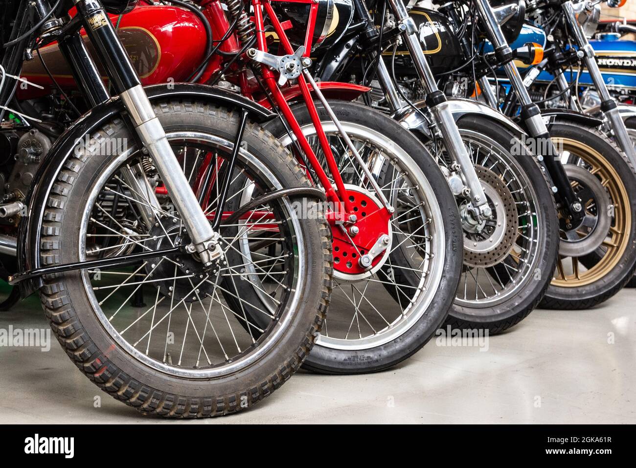Various old motorcycles in a row Stock Photo