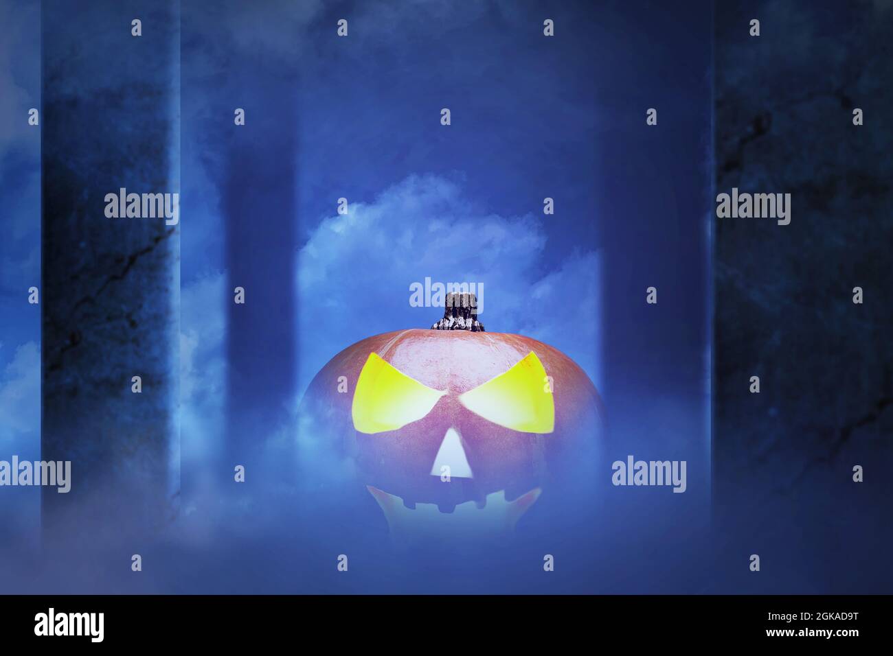 Jack-o-Lantern with smoke and dark background Stock Photo - Alamy