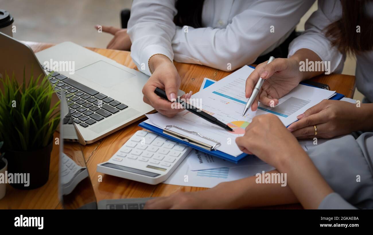 Business People Analyzing Statistics Business Documents, Financial Accounting Concept. Stock Photo