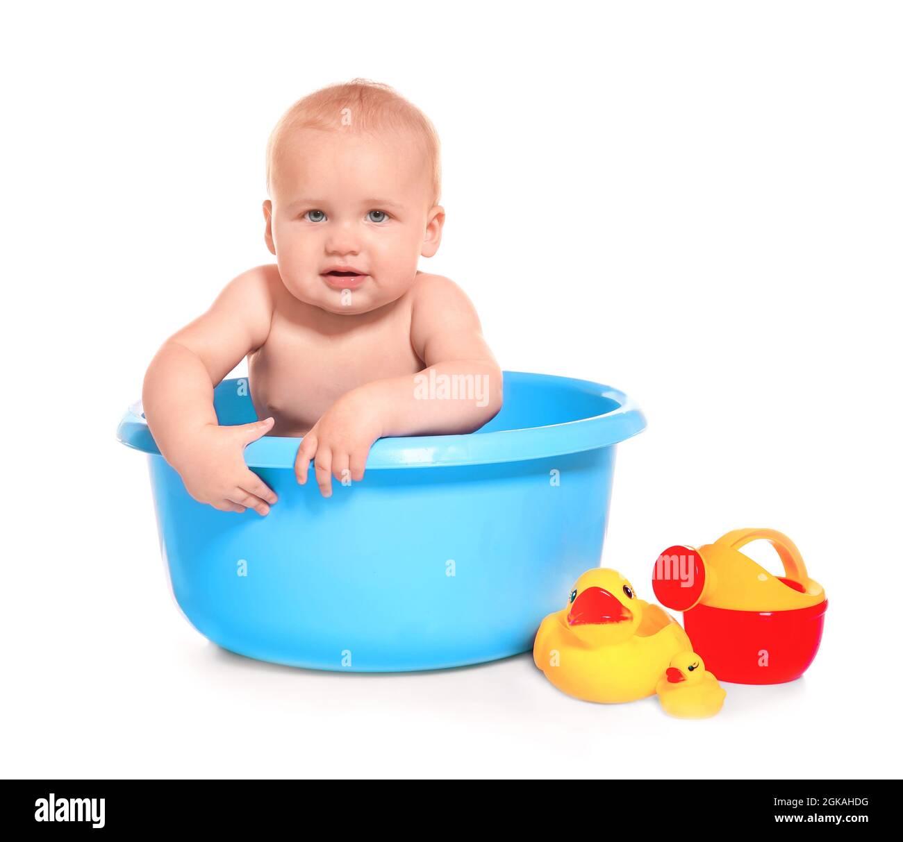 Cute baby washing in bath basin on white background Stock Photo - Alamy