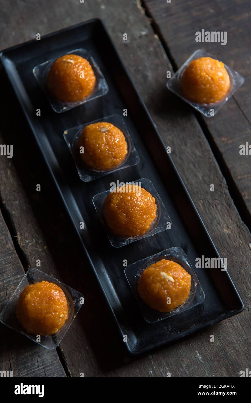 Indian traditional sweet motichur laddu or laddoo made of gram flour balls deep fried and dipped in sugar syrup Stock Photo