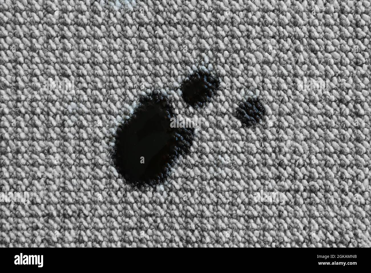 Black stains on carpet. Cleaning concept Stock Photo Alamy