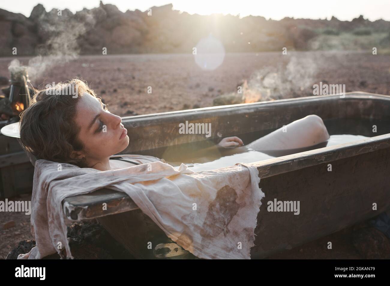 Woman lying in desert hi-res stock photography and images - Alamy