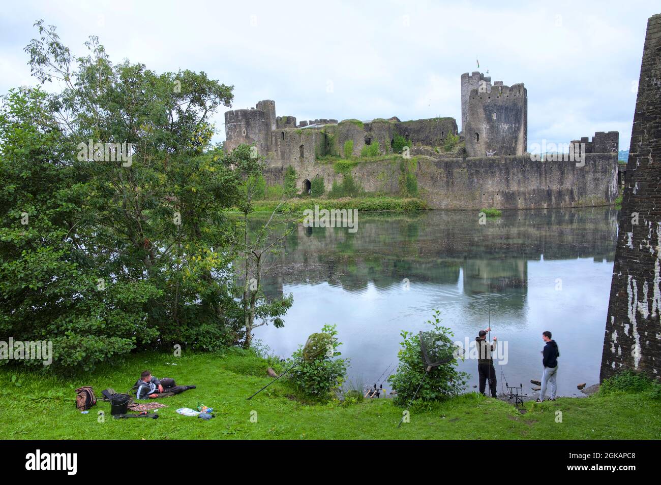 Fishing by Caerphilly Castle, South Wales, UK Stock Photo