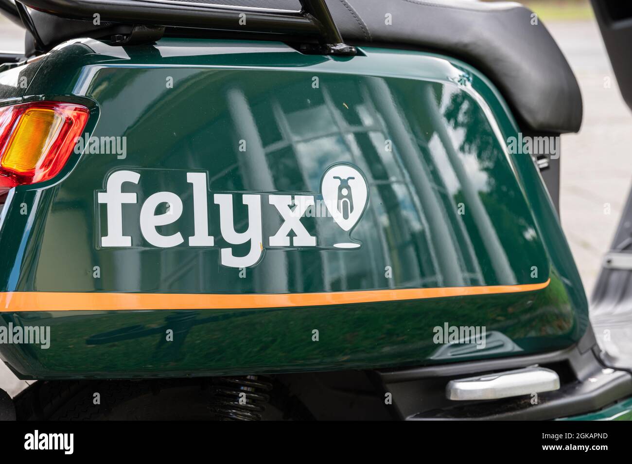 Logo of the company felyx on an e-scooter in partial view Stock Photo