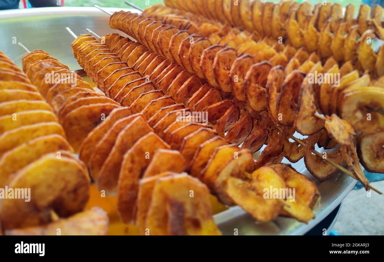 Round twisted potato fry with stick.Crispy Potato Fry Stock Photo Alamy