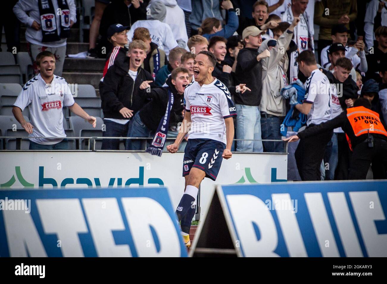 Aarhus, Denmark. 12th, September 2021. Mikael Anderson (8) of AGF scores for 1-0 during the 3F Superliga match between Aarhus GF and Vejle Boldklub at Ceres Park in Aarhus. (Photo credit: Gonzales Photo - Morten Kjaer). Stock Photo