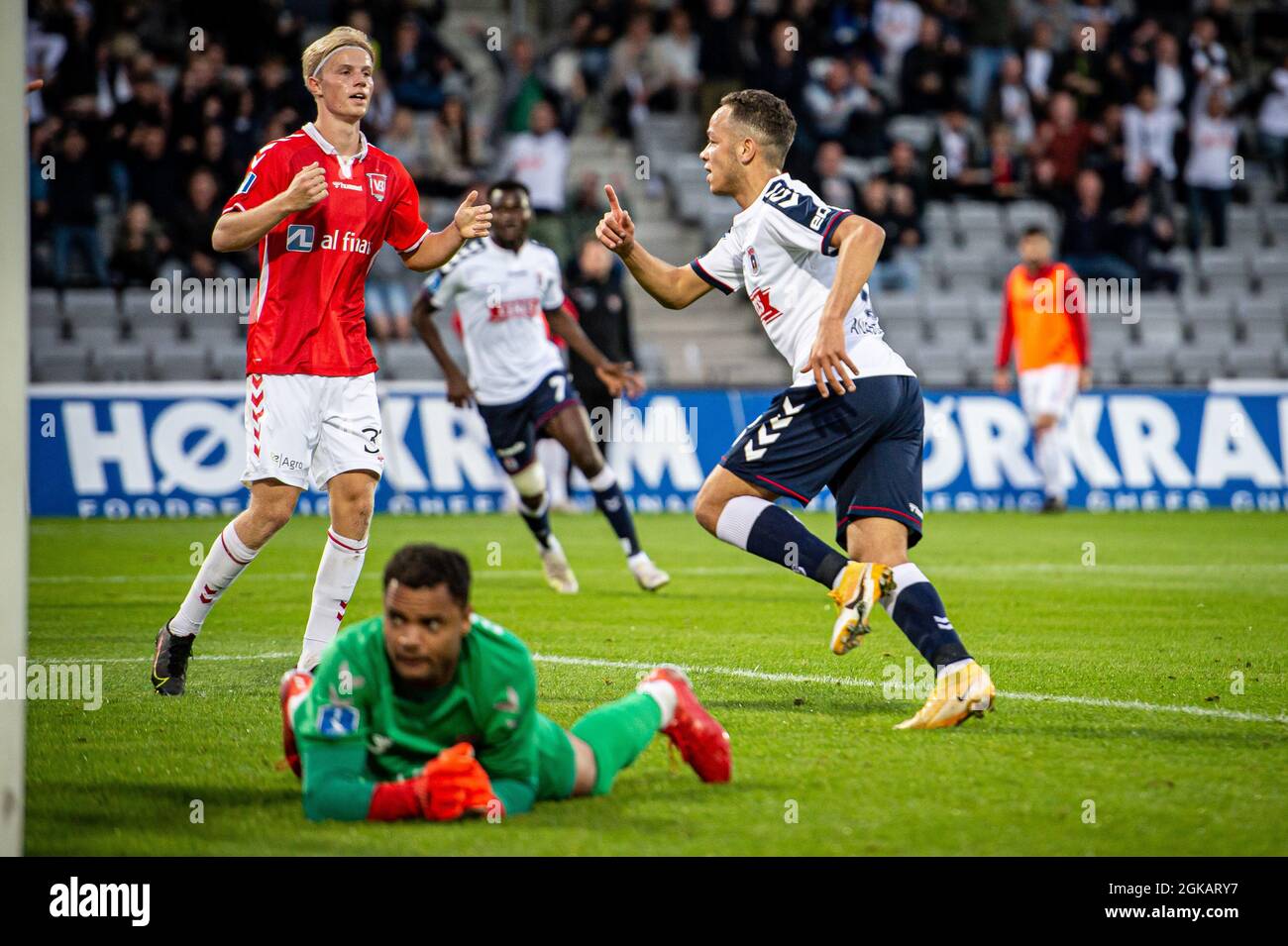 Aarhus, Denmark. 12th, September 2021. Mikael Anderson (8) of AGF scores for 1-0 during the 3F Superliga match between Aarhus GF and Vejle Boldklub at Ceres Park in Aarhus. (Photo credit: Gonzales Photo - Morten Kjaer). Stock Photo