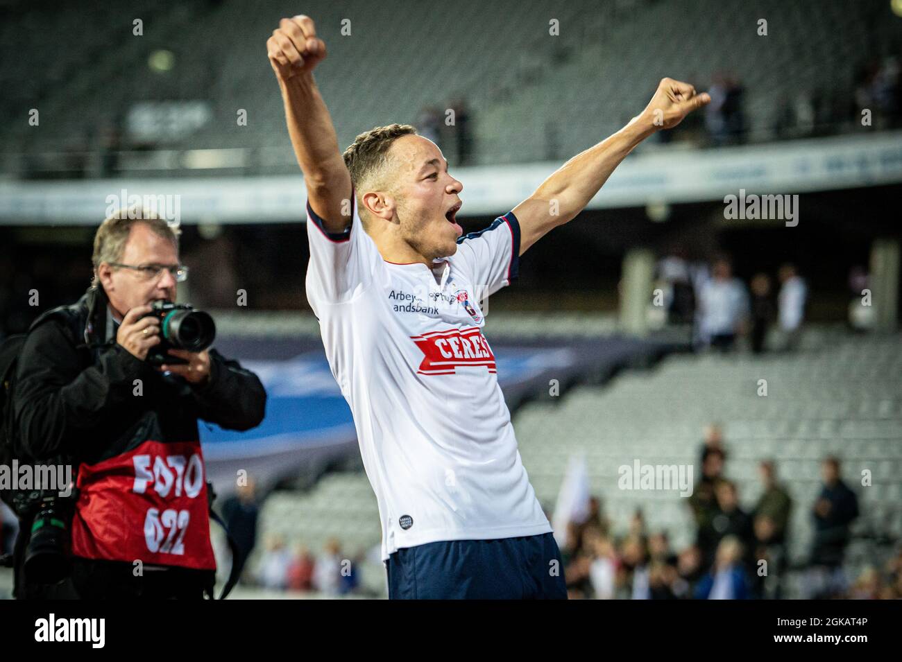 Aarhus, Denmark. 12th, September 2021. Mikael Anderson (8) of AGF celebrates the victory after 3F Superliga match between Aarhus GF and Vejle Boldklub at Ceres Park in Aarhus. (Photo credit: Gonzales Photo - Morten Kjaer). Stock Photo