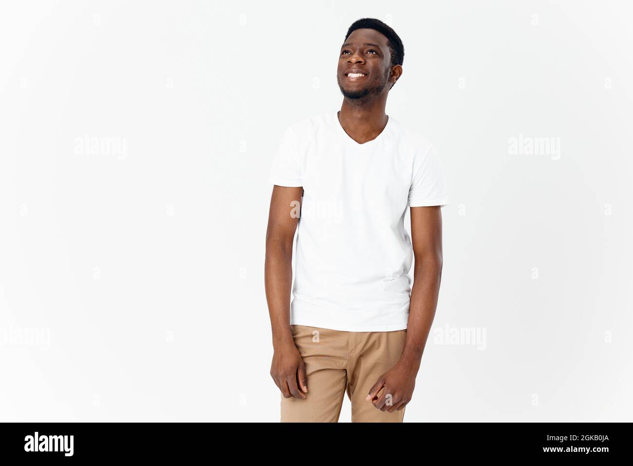 happy african man in white t-shirt and 