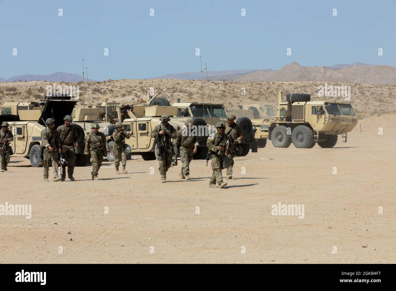 Soldiers assigned to the 700th Brigade Support Battalion, 45th Infantry Brigade Combat Team, Oklahoma Army National Guard prepare for a tactical exercise at the National Training Center at Fort Irwin, California, July, 16 2021. Members of the 45th IBCT are at the NTC as part of their annual training, which provides opportunities to conduct individual, squad and platoon-level tasks in austere environments in preparation for potential deployments overseas. Stock Photo