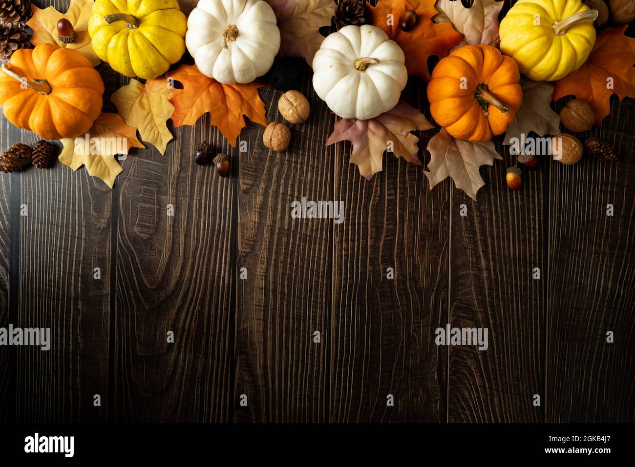 Happy Thanksgiving Day with pumpkin and nut on wooden table Stock Photo ...