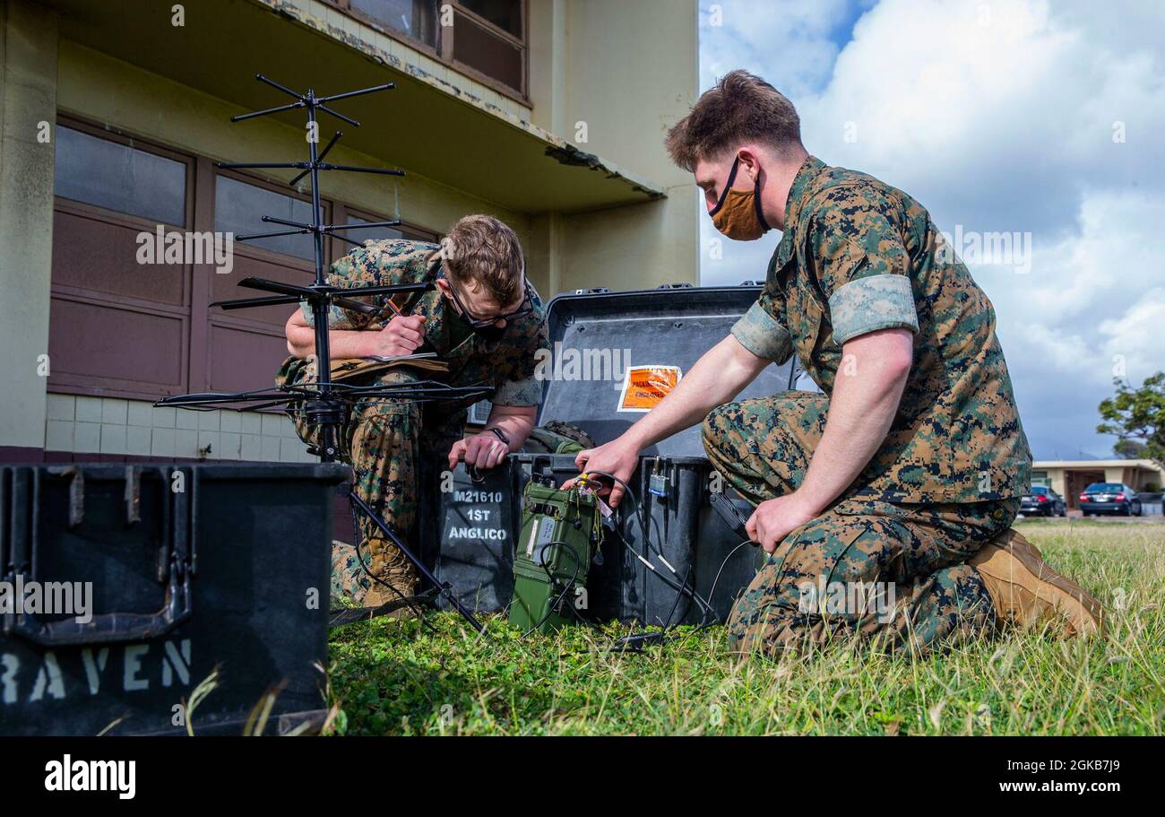 U.S Marine Corps Sgt. Dylan Griffin, right, a radio operator with 1st Air  Naval Gunfire Liaison Company (ANGLICO), I Marine Expeditionary Force  Information Group, I Marine Expeditionary Force (I MEF), shows Lance