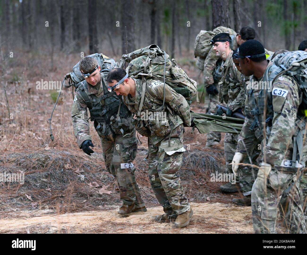 Civil Affairs candidates at the U.S. Army John F. Kennedy Special Warfare Center and School participate in a team-building event during Civil Affairs Assessment and Selection (CAAS) at Camp Mackall, North Carolina, March 2, 2021. The candidates who attended the 10-day course were evaluated for trainability and suitability to attend the Civil Affairs Team Leader or the Civil Affairs Noncommissioned Officer pathway and for the attributes and competencies required to be a member of a Civil Affairs Team. Stock Photo