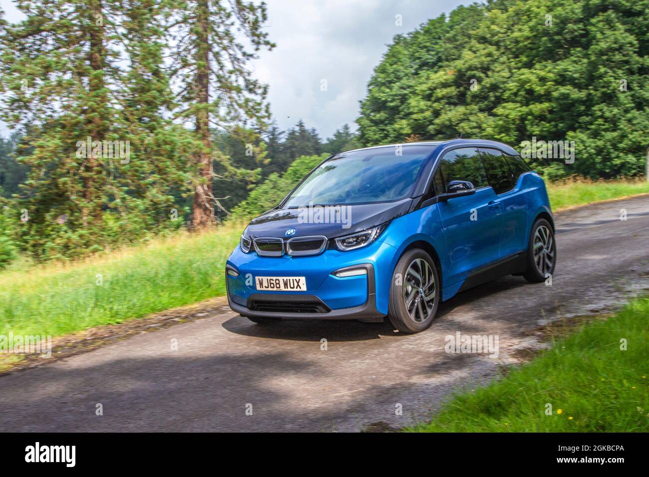 2018 blue BMW i3 1 speed automatic 600cc hybrid electric  en-route KLMC at ‘The Cars the Star Show” in Holker Hall & Gardens, Grange-over-Sands, UK Stock Photo