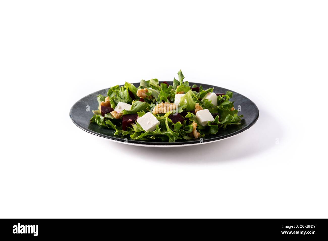 Beetroot salad with feta cheese,lettuce and walnuts isolated on white background Stock Photo