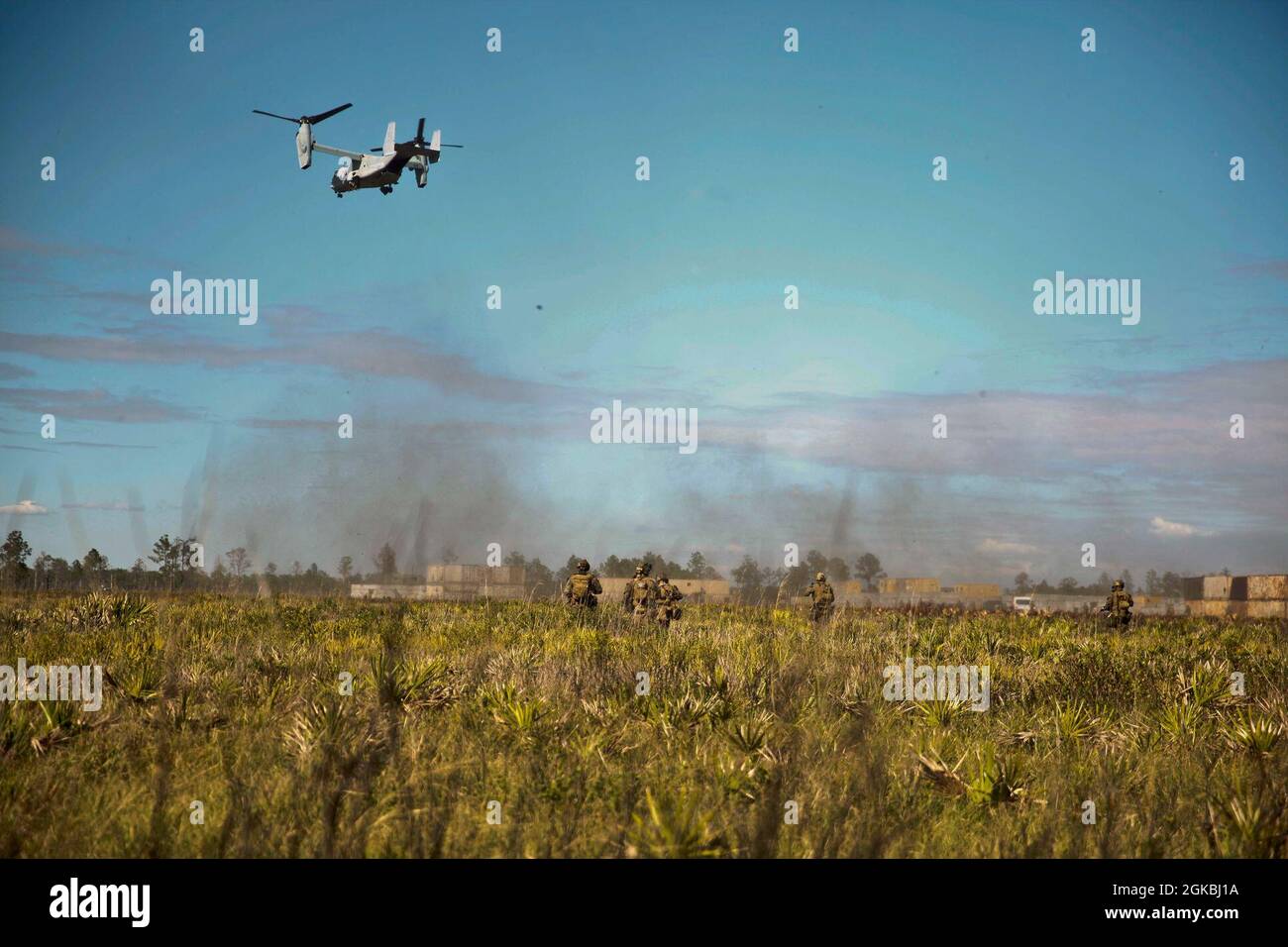 An MV-22 Osprey with the 24th Marine Expeditionary Unit (MEU) departs an objective area while participating in an amphibious raid during Composite Unit Training Exercise (COMPTUEX) at Avon Park, Florida on March 4, 2021. COMPTUEX is a month-long training event designed to test the MEU’s capabilities against the full spectrum of military operations. Stock Photo