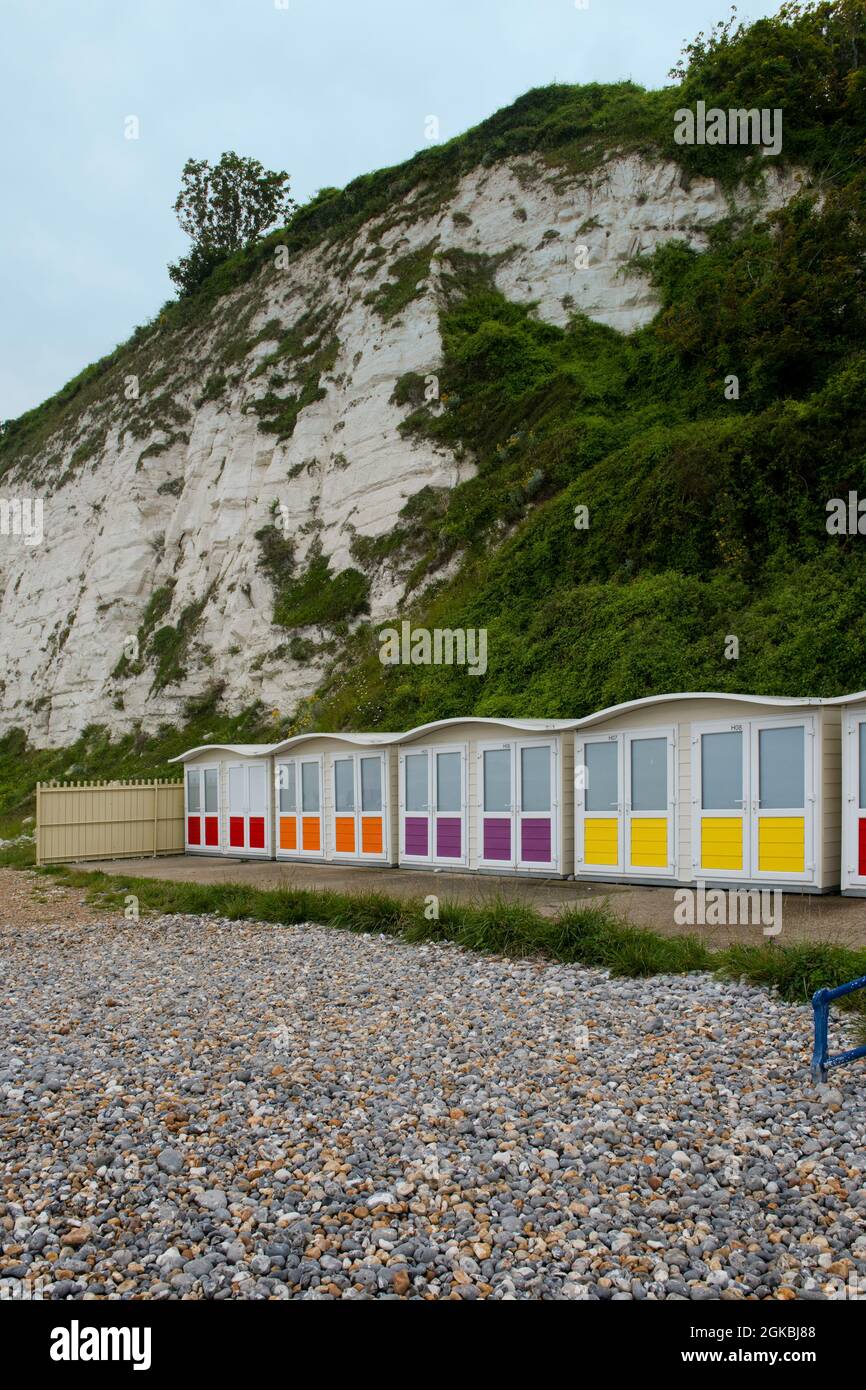 Colourful beack huts in the English South Coast town of Eastbourne, Sussex, England, UK Stock Photo