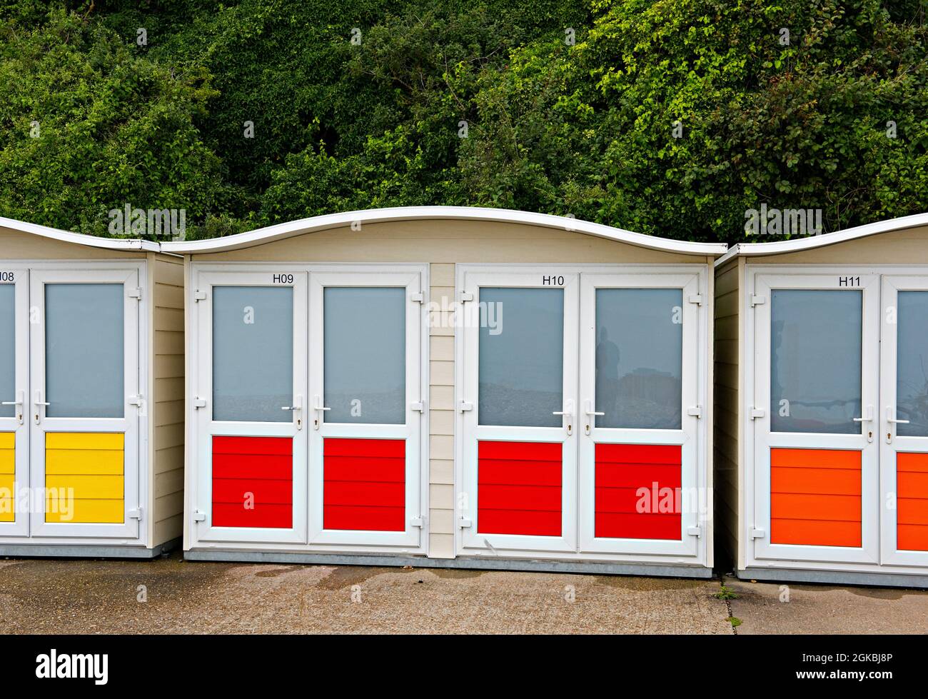 Colourful beack huts in the English South Coast town of Eastbourne, Sussex, England, UK Stock Photo