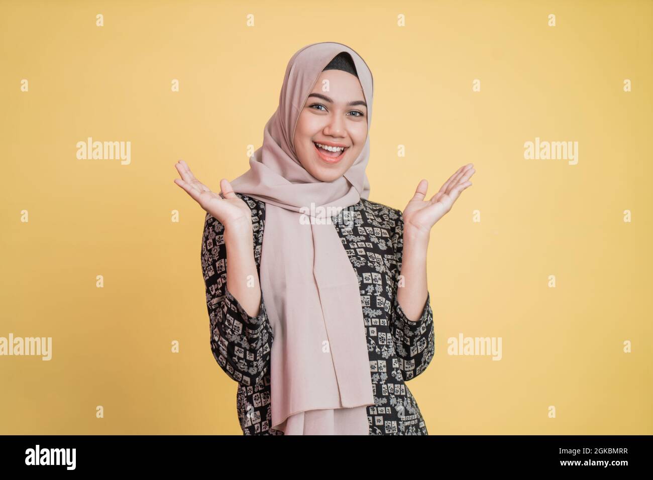 Muslim woman raising hand hi-res stock photography and images - Alamy