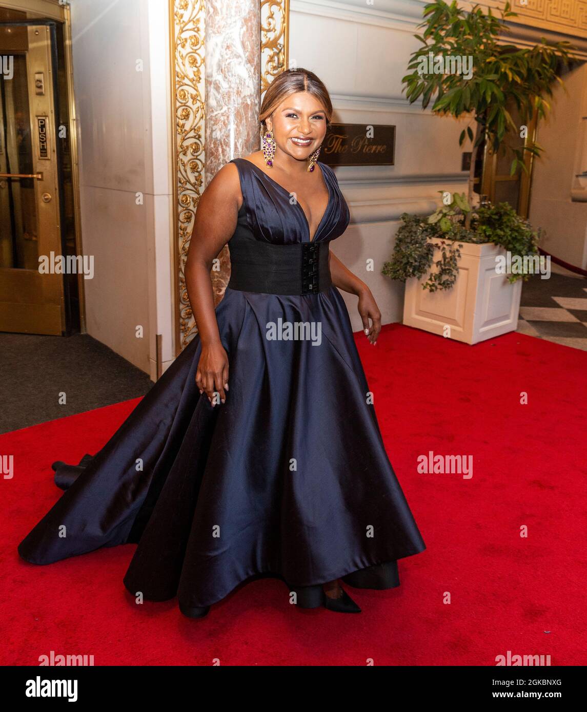 New York, United States. 12th Sep, 2021. Mindy Kaling wearing dress by Tory  Burch departs The Pierre Hotel for Met Gala Celebrating In America: A  Lexicon Of Fashion. (Photo by Lev Radin/Pacific