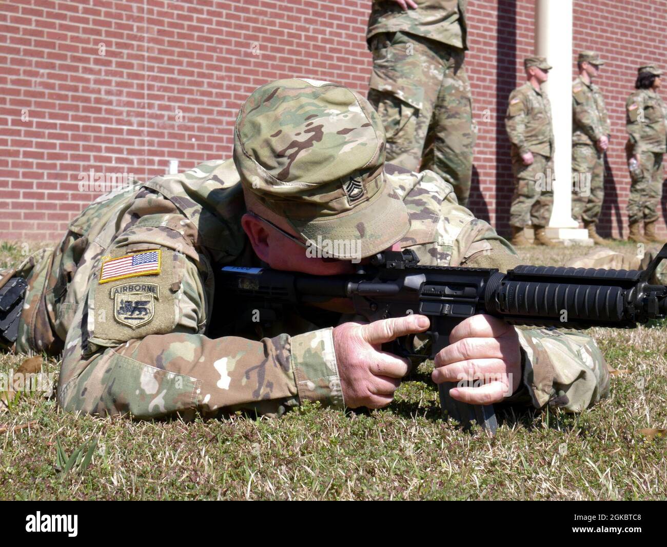 Sgt.1st Class Brad McCormick, 184th Sustainment Command, handles the M4 Carbine during primary marksmanship instruction given in Monticello, Ms. during March drill. PMI is practiced to instruct on proper firearm handling and shooting techniques before qualifying on a pop-up target range. Stock Photo