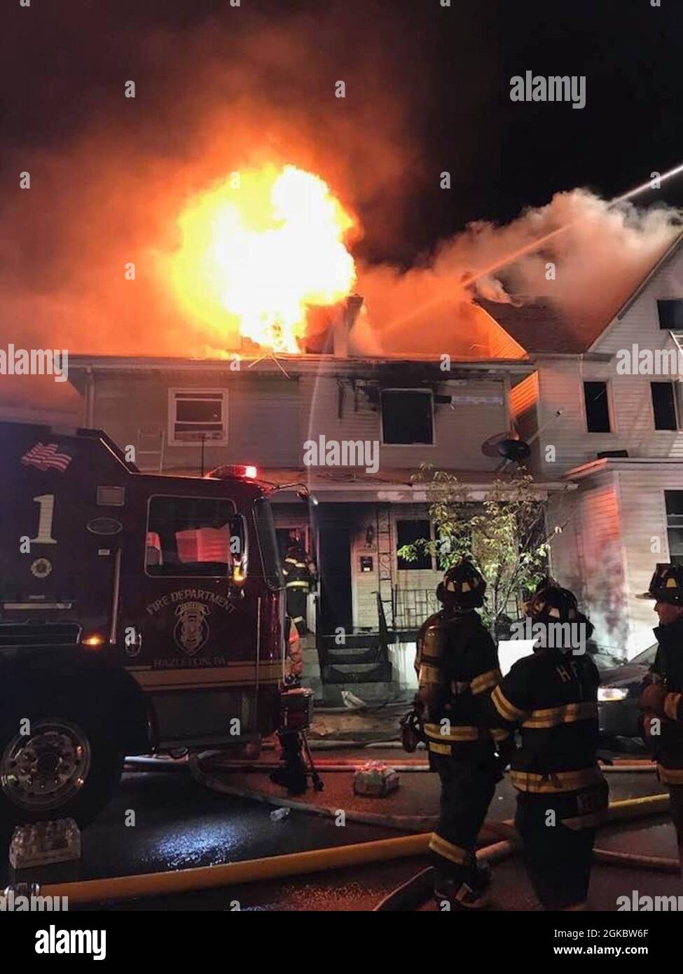 Warrant Officer Eric Martinez while on-call to a house fire with the Hazleton, PA fire department. Stock Photo