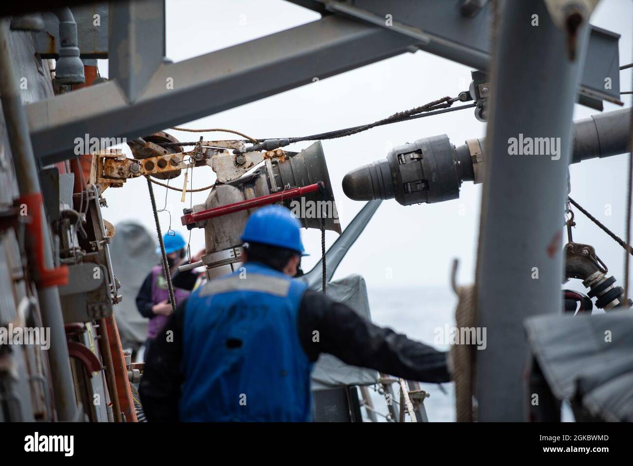 210307-N-QD512-1331 ATLANTIC OCEAN (March 7, 2021) A fuel probe is seated aboard the Arleigh Burke-class guided-missile destroyer USS Mitscher (DDG 57) during a replenishment-at-sea with the Supply-class fast combat supply support ship USNS Arctic (T-AOE 8), March 7, 2021. Mitscher is operating with the Ike Carrier Strike Group on a routine deployment in the U.S. Sixth Fleet area of operations in support of U.S. national interests and security in Europe and Africa. Stock Photo