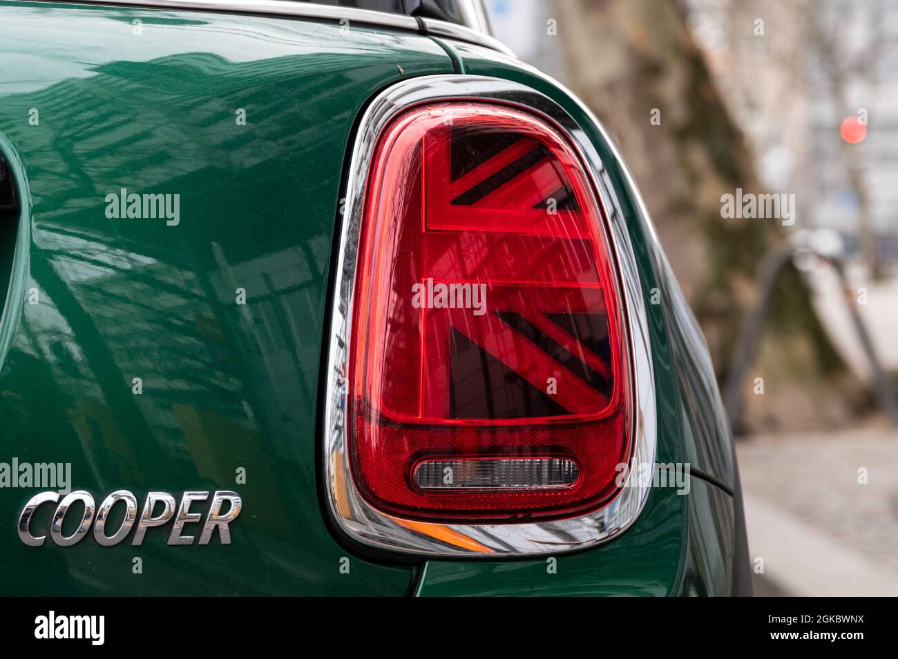 a green mini cooper from the rear right Stock Photo