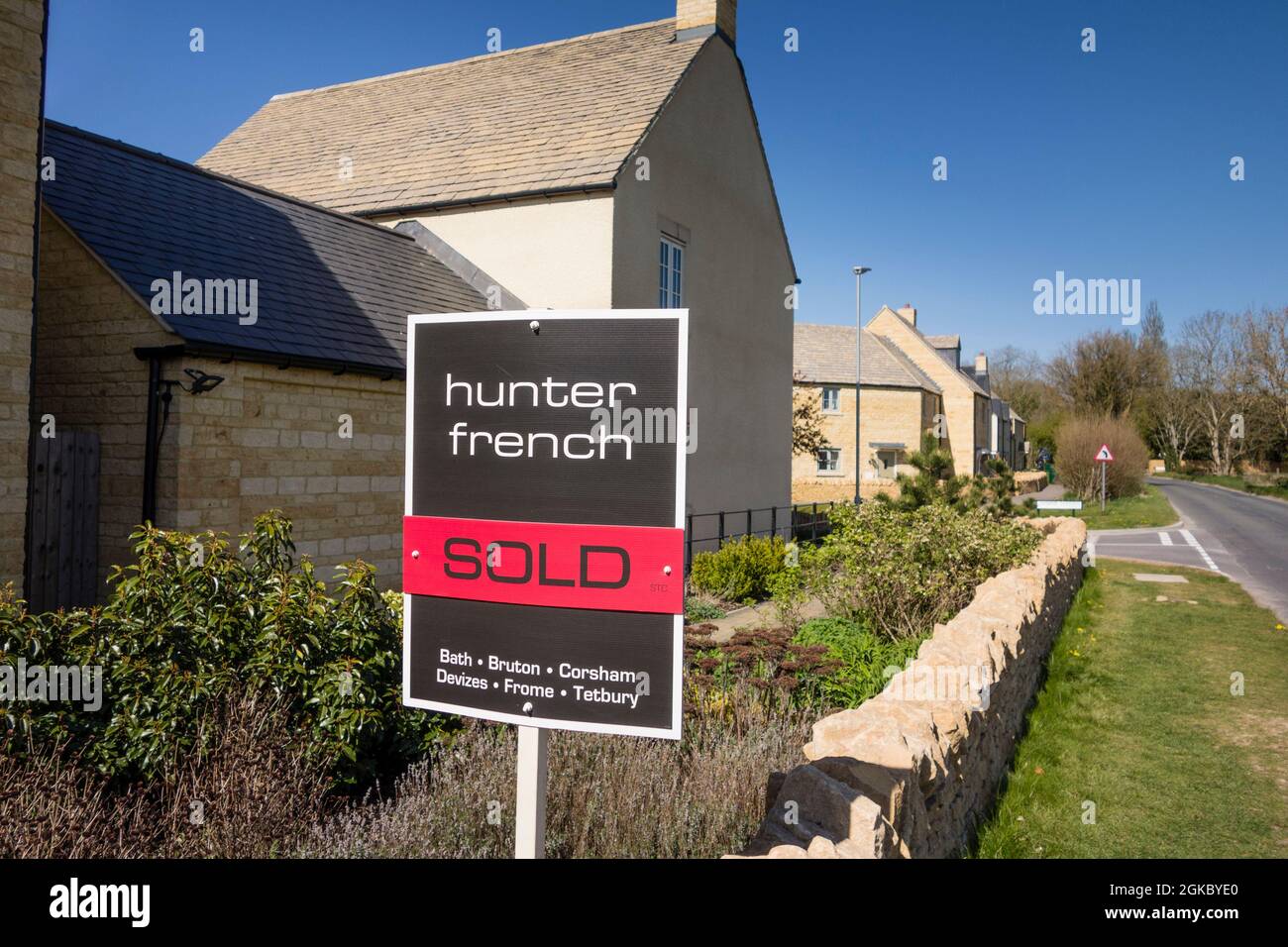 Hunter French estate agent's sold sign, Tetbury, Gloucestershire, UK