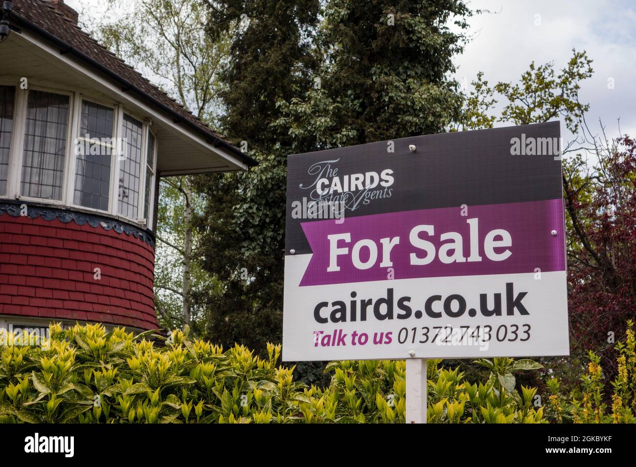 Cairds estate agent's For Sale sign, Epsom, Surrey, UK Stock Photo