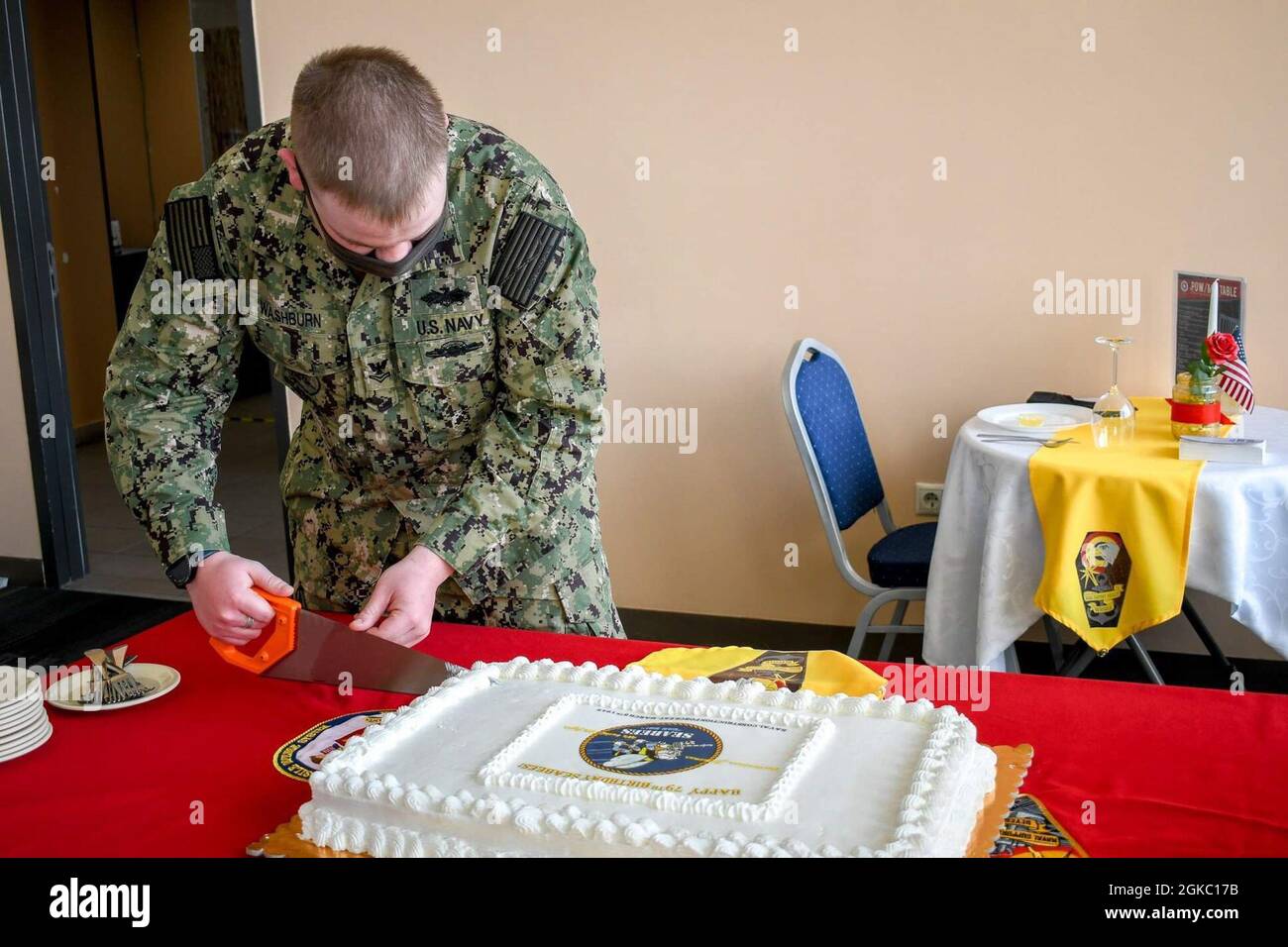 NAVAL SUPPORT FACILITY DEVESELU, Romania (March 5, 2021) Seabees, Civil Engineer Corps officers and Sailors commemorate the Naval Facilities Engineering Systems Command, Seabee and Civil Engineer Corps annual birthday. Due to the COVID-19 host nation policies, members were allowed to have a small cake cutting ceremony. Stock Photo
