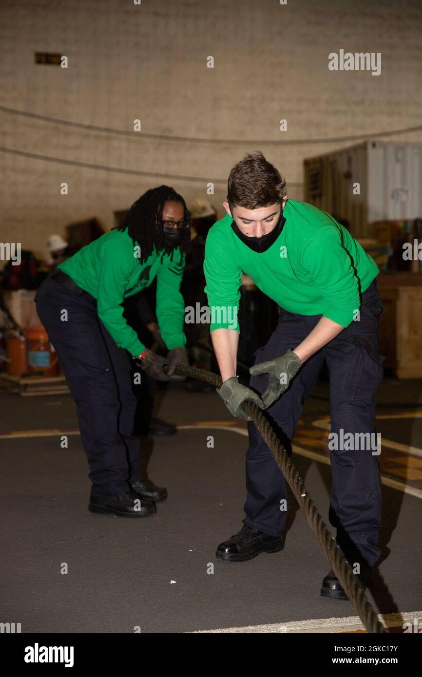 Aviation Boatswain's Mate (Equipment) 2nd Class Stacy Jones, left, from