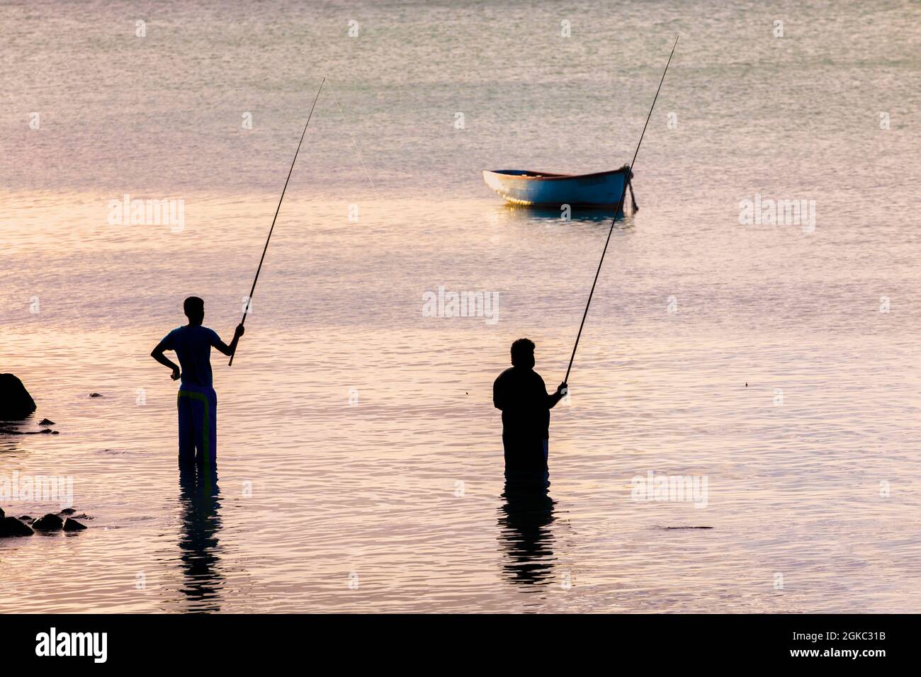 Two african men fishing hi-res stock photography and images - Alamy