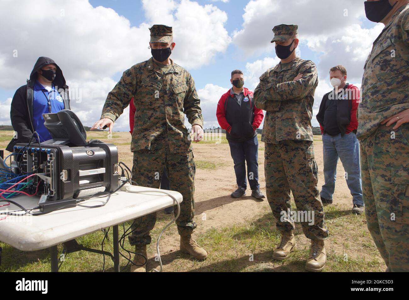 U.S. Marine Corps Lt. Col. Daniel Bartos (left) with Defense ...