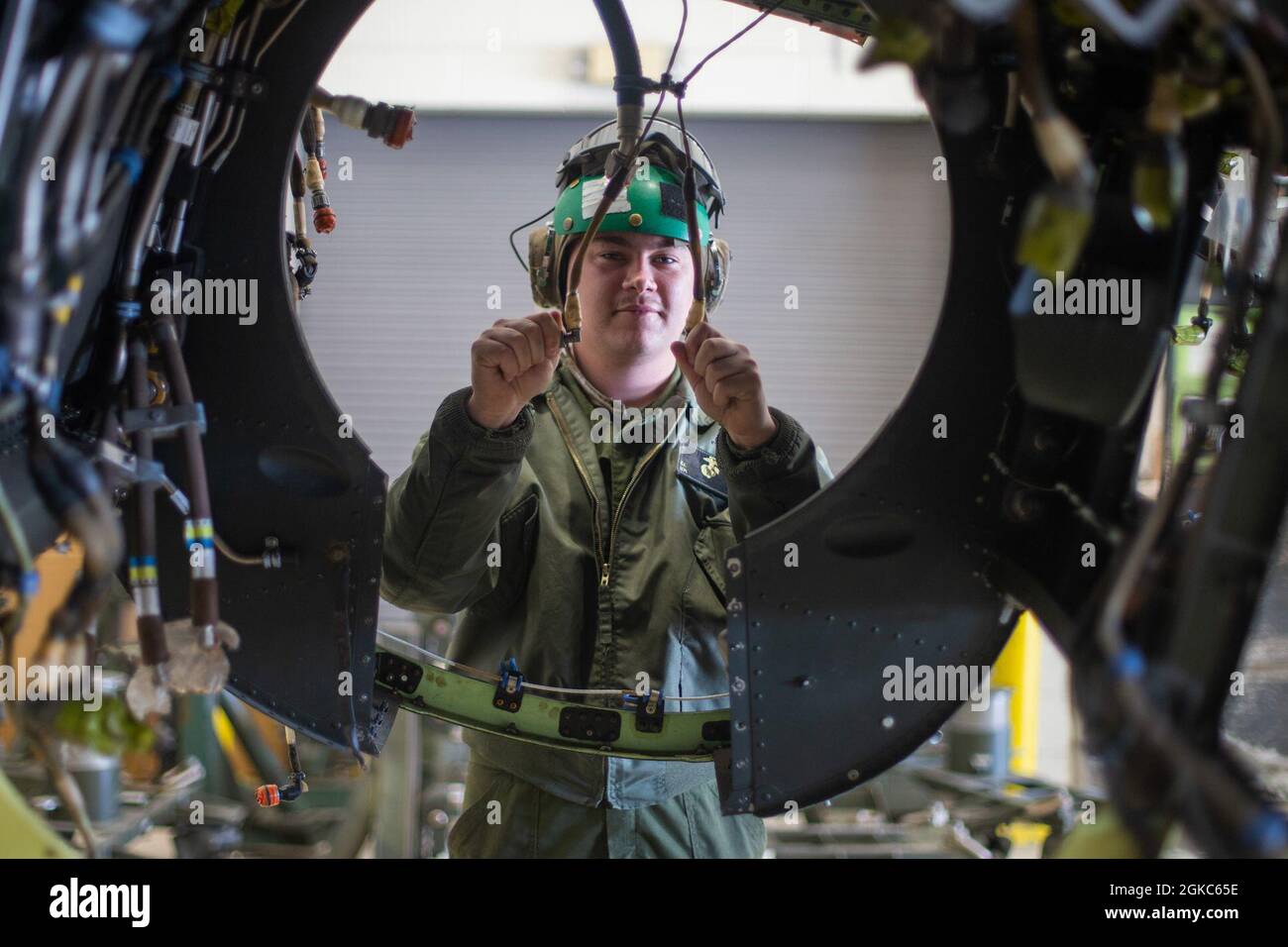U.S. Marine Corps Lance Cpl. Colin Kelly, an aircraft communications/navigation/electrical/weapons system technician with Marine Medium Tiltrotor Training Squadron (VMMT) 204, poses for a photo at Marine Corps Air Station New River, North Carolina, March 10, 2021. Kelly's, a native of Warrington, Pennsylvania, has a simple motto: “Let’s go fix some stuff.' According to his leadership, Kelly's keen discernment gained more than 130 maintenance hours on aircraft for the month of February. Kelly also ensured that new Marines who recently joined the unit were set up with barracks rooms, given compu Stock Photo